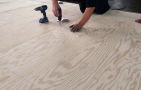 Flooring and interior upholsery restoration of an old pontoon performed by Mike's Marine & Small Engine Repair